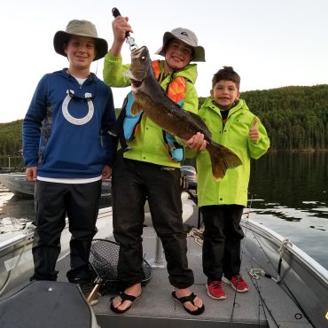 Three Boys Posing With A Walleye